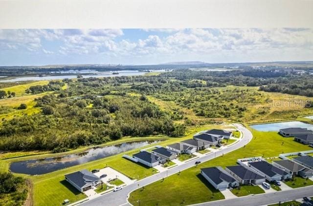 bird's eye view with a water view