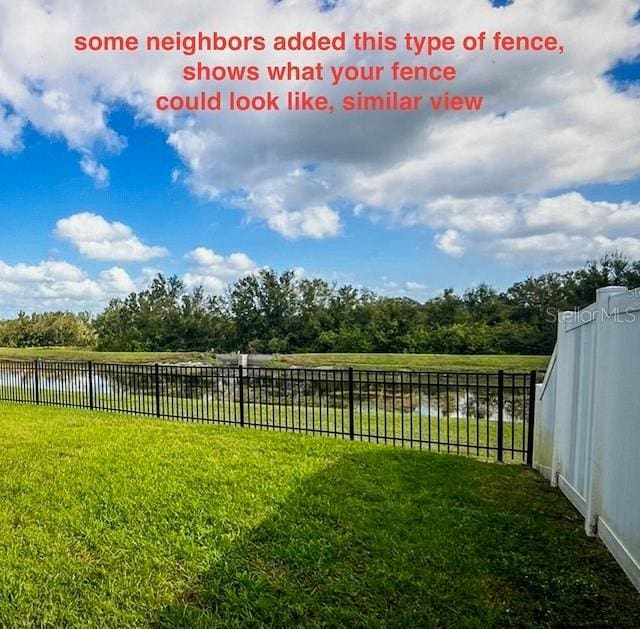 view of yard with a water view