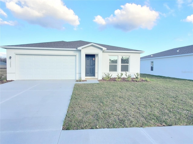 ranch-style house with a front yard and a garage