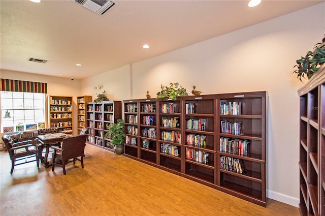 office space with hardwood / wood-style flooring