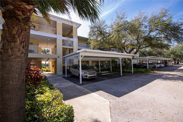 view of car parking featuring a carport