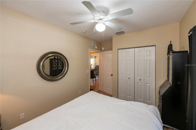 bedroom with a closet and ceiling fan