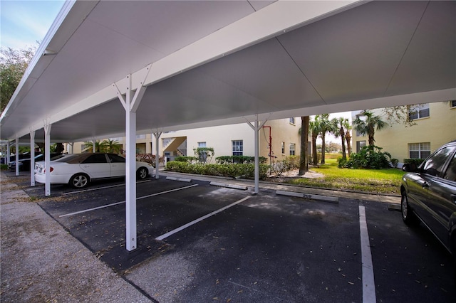 view of parking featuring a carport