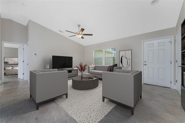 living room featuring high vaulted ceiling and ceiling fan