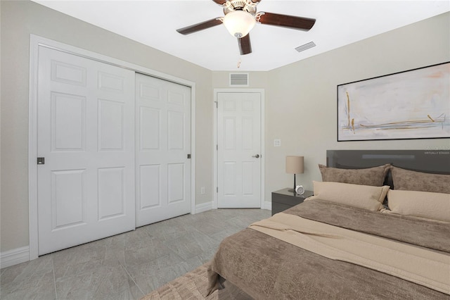 bedroom featuring a closet and ceiling fan