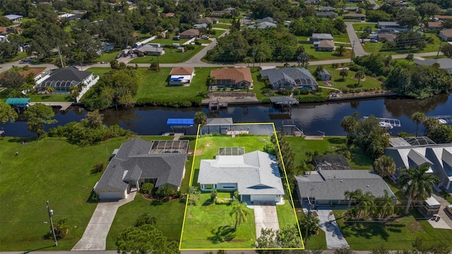 drone / aerial view with a water view