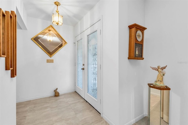 entrance foyer featuring french doors