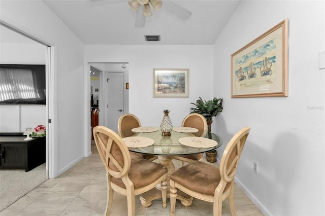 dining room with ceiling fan