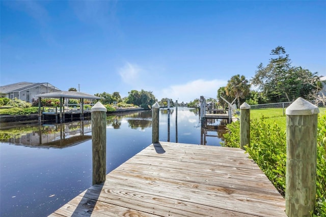 dock area with a water view