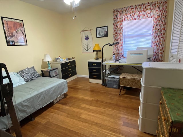 bedroom featuring hardwood / wood-style flooring