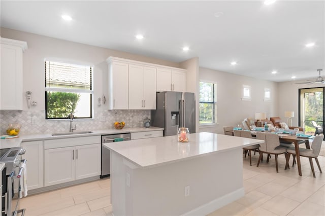 kitchen with white cabinets and stainless steel appliances