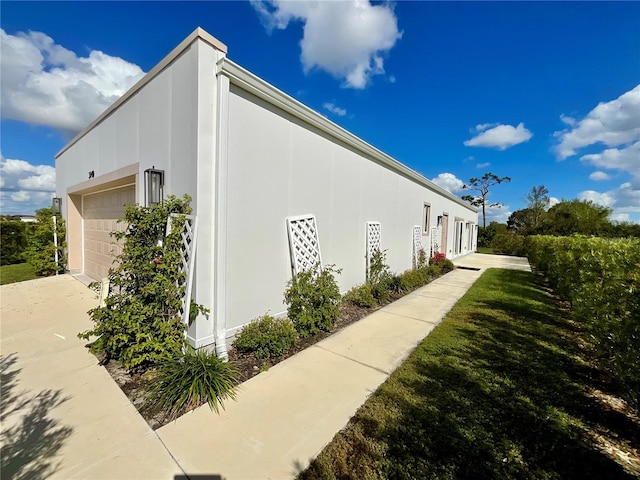 view of property exterior with a garage