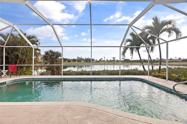 view of swimming pool featuring a water view, a patio, and a lanai