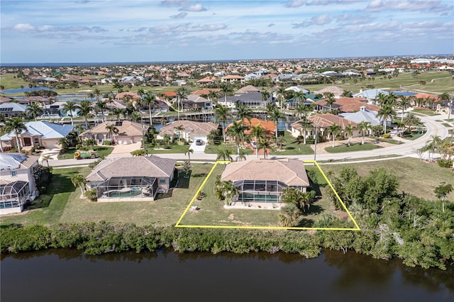 bird's eye view with a water view