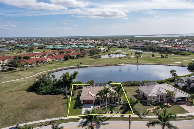 drone / aerial view with a water view