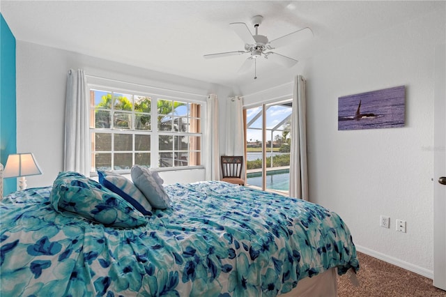 carpeted bedroom with ceiling fan and access to exterior