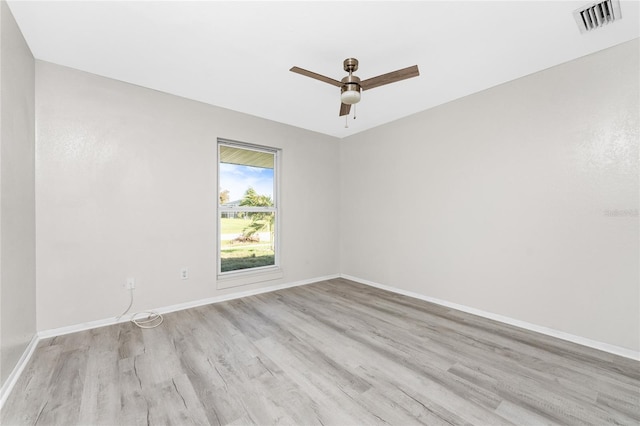 unfurnished room featuring light hardwood / wood-style floors and ceiling fan