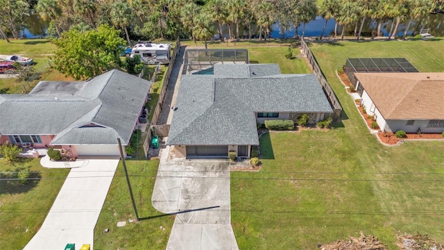 birds eye view of property featuring a water view