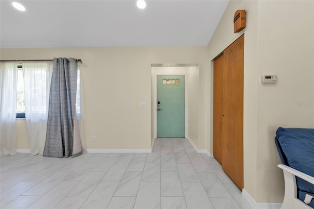 interior space featuring vaulted ceiling