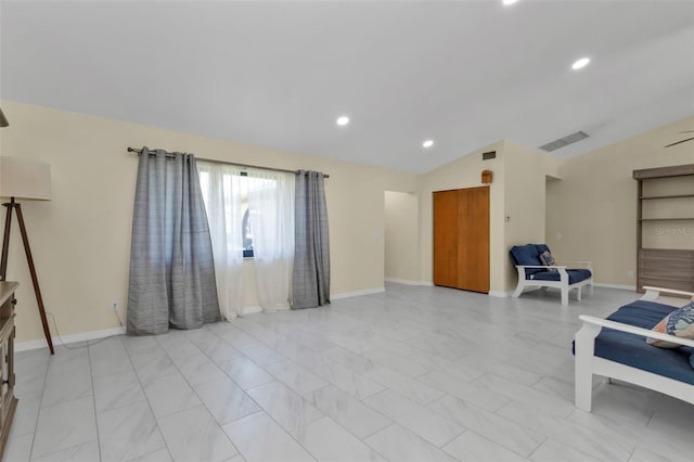 living room with vaulted ceiling