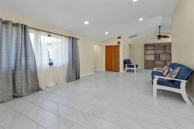 sitting room featuring lofted ceiling and ceiling fan