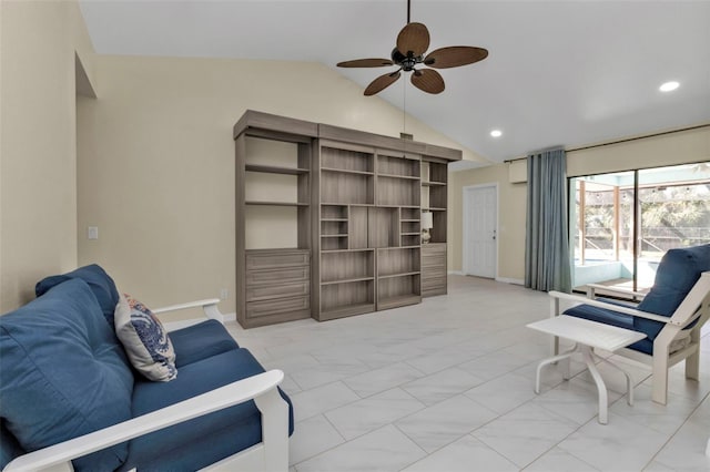 living room featuring vaulted ceiling and ceiling fan