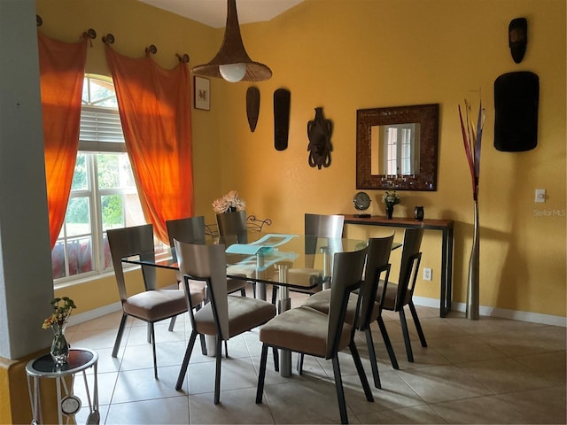 dining room with tile patterned flooring