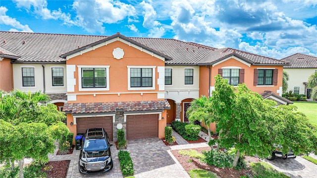 view of front of home with a garage