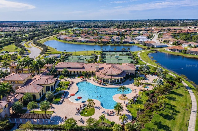 birds eye view of property featuring a water view