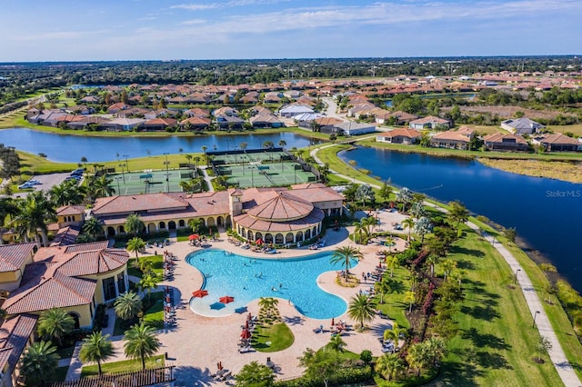 bird's eye view with a water view