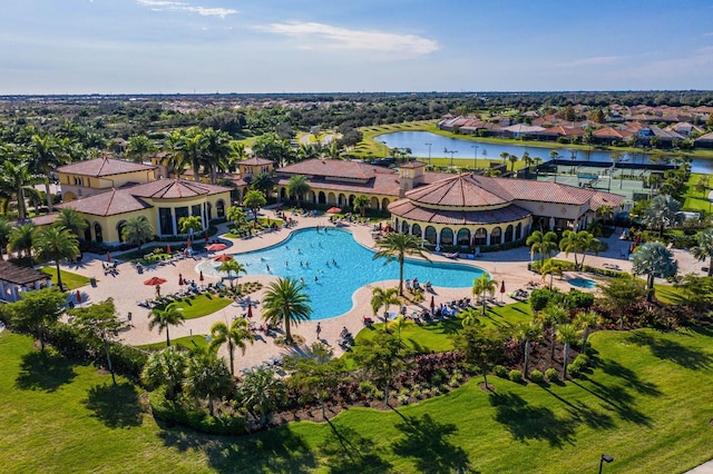 drone / aerial view with a water view