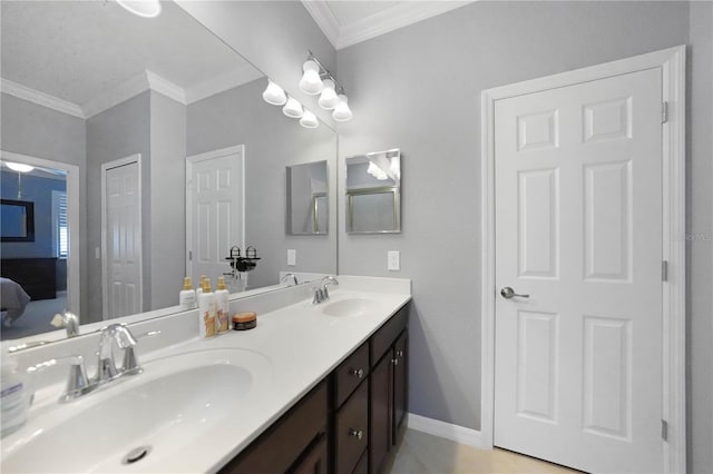 bathroom with vanity and crown molding