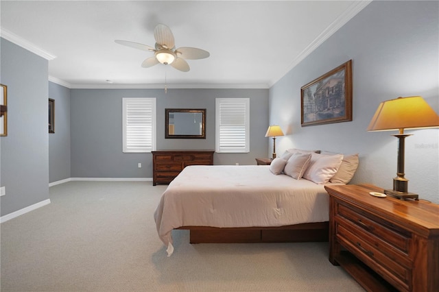 carpeted bedroom with ceiling fan and ornamental molding