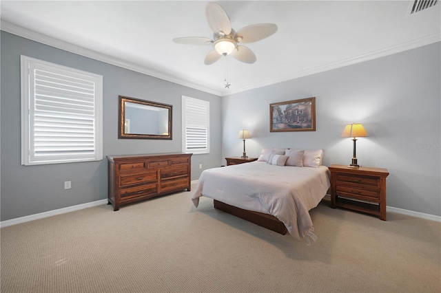 bedroom featuring ceiling fan, crown molding, and light carpet