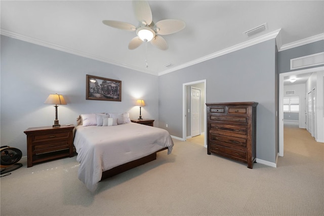 bedroom with light carpet, ceiling fan, and crown molding