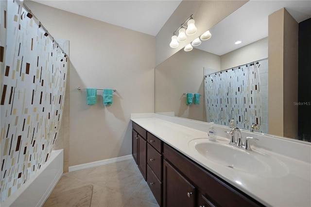 bathroom with tile patterned flooring, vanity, and shower / tub combo with curtain