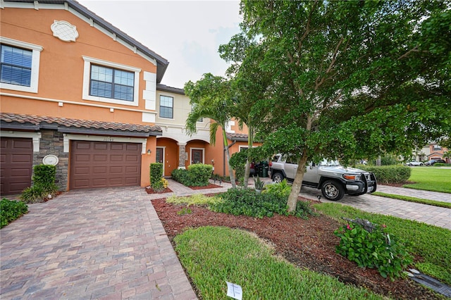 view of front of home with a garage