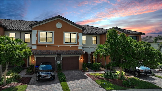 view of front of home with a garage