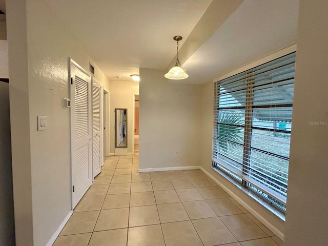 interior space featuring light tile patterned flooring