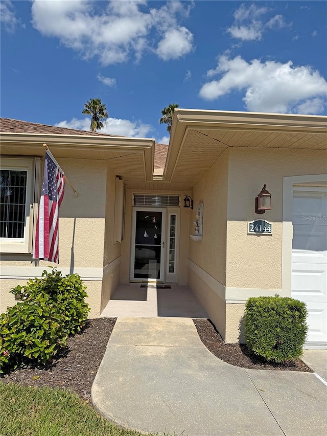 property entrance featuring a garage