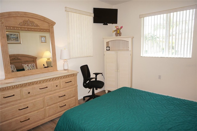 bedroom featuring hardwood / wood-style flooring