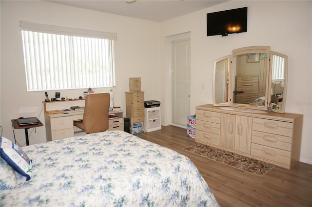 bedroom featuring dark hardwood / wood-style floors