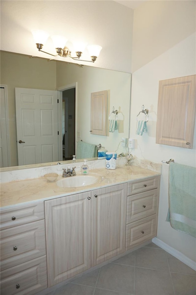 bathroom with vanity and tile patterned flooring