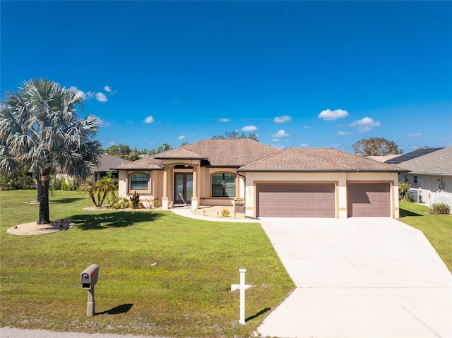 view of front facade featuring a front lawn and a garage