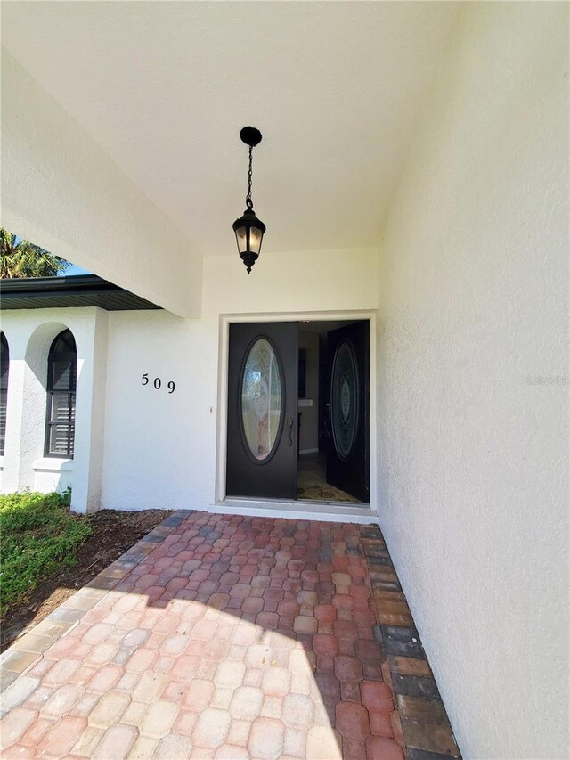 509 Clearview Dr, Port Charlotte, FL 33953 - property entrance with stucco siding
