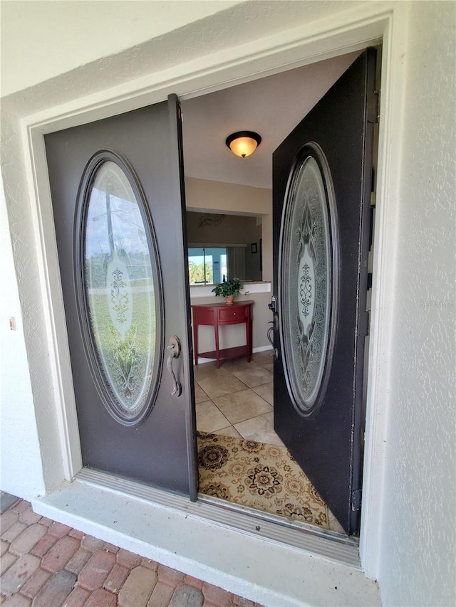 509 Clearview Dr, Port Charlotte, FL 33953 - doorway to property with stucco siding