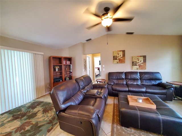 living room featuring lofted ceiling, ceiling fan, and light tile patterned floors