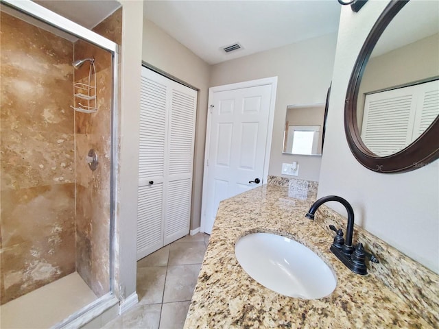 509 Clearview Dr, Port Charlotte, FL 33953 - full bath featuring a closet, a shower stall, tile patterned flooring, and vanity