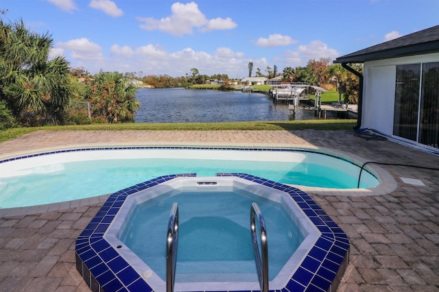 509 Clearview Dr, Port Charlotte, FL 33953 - view of swimming pool with a water view and a pool with connected hot tub