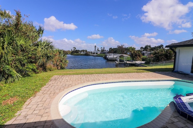 view of pool featuring a water view